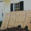 Plywood protects windows and siding